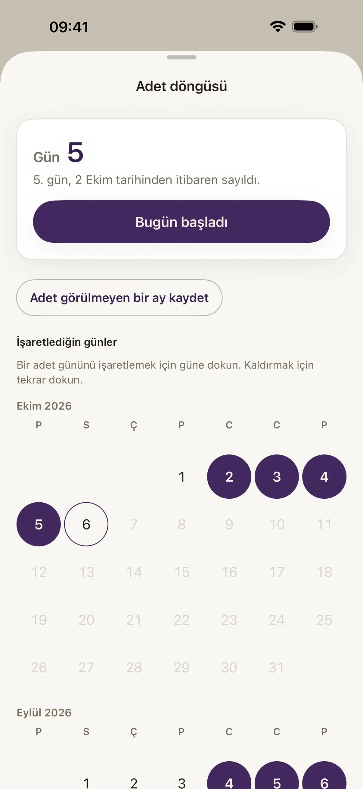 Damson'ın döngü sayfası: 2 Ekim'den sayılan 5. gün ve adet günlerinin işaretli olduğu bir takvim.