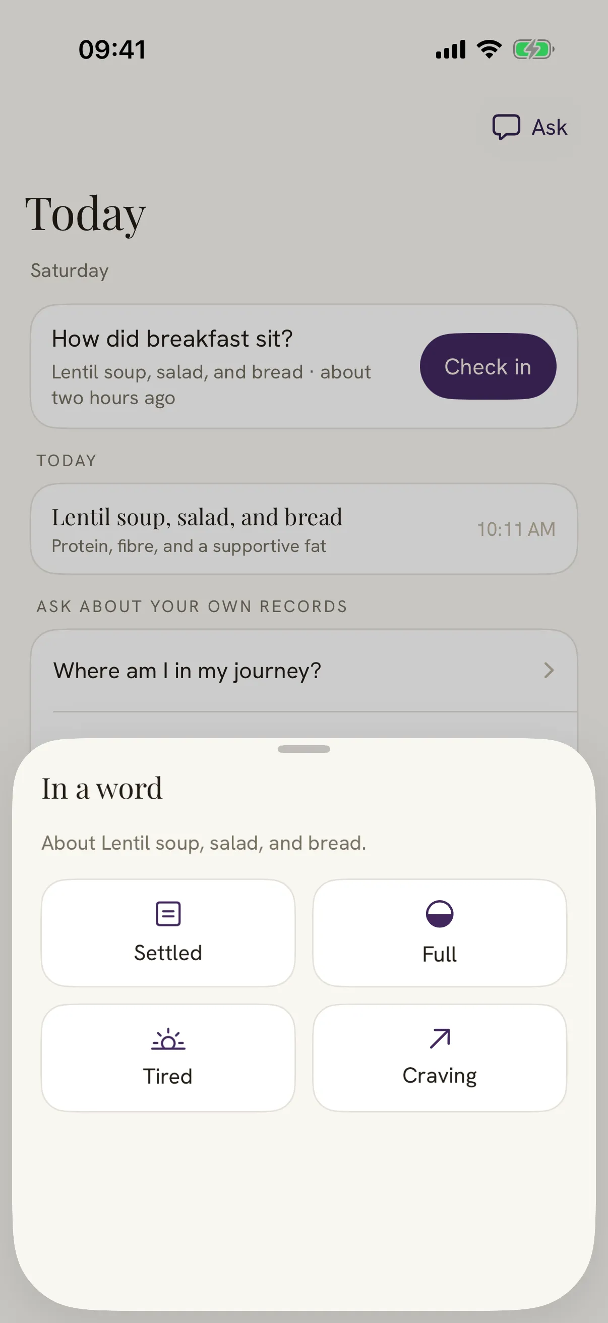 A check-in sheet titled in a word, offering four answers about a meal: settled, full, tired, and craving.