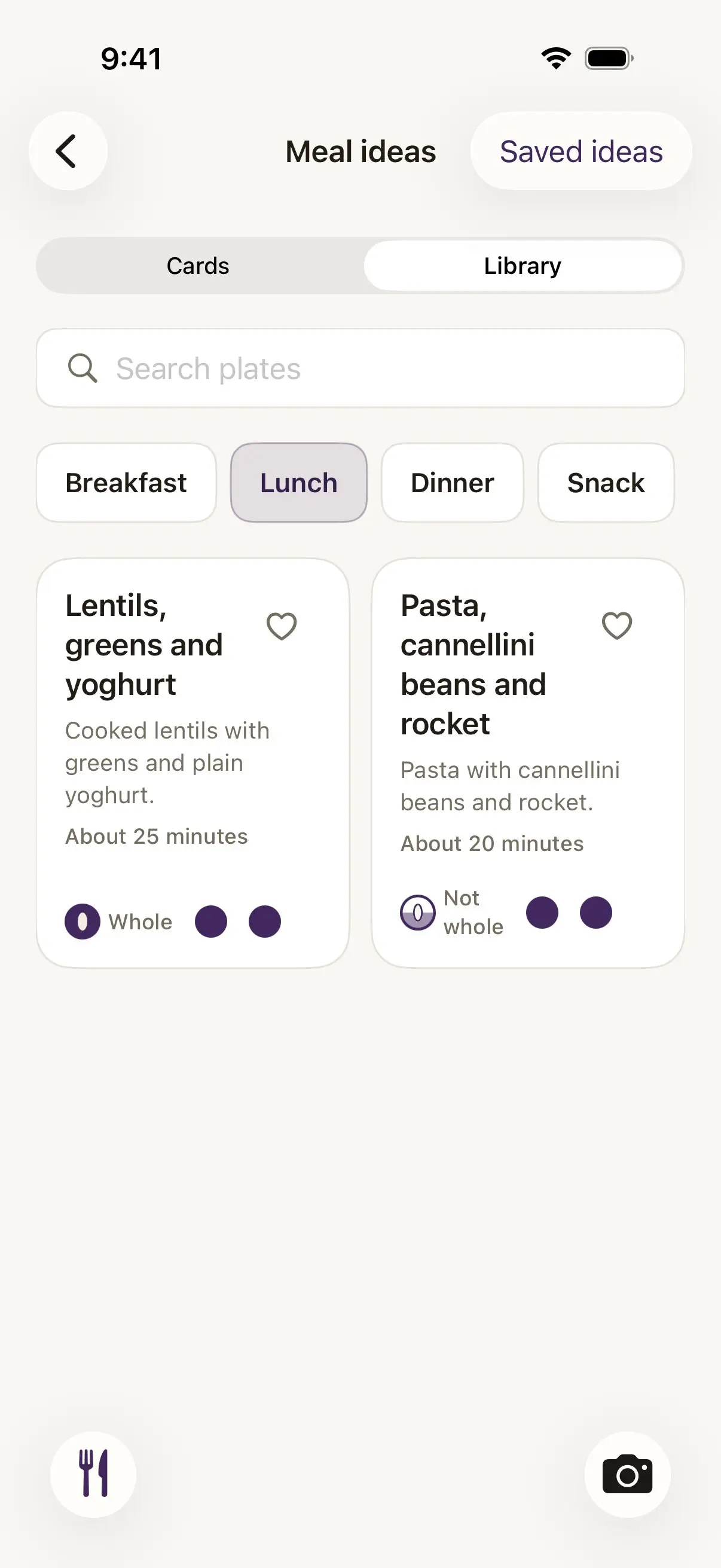 Damson's plate library tab, with a Search plates field and Breakfast, Lunch, Dinner and Snack chips, Lunch selected. Two plates are shown: lentils, greens and yoghurt, about 25 minutes, marked whole, and pasta, cannellini beans and rocket, about 20 minutes, marked not whole, each with a heart to keep it.
